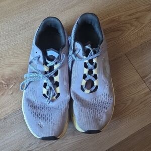 On Running Light Gray and Yellow Sneakers